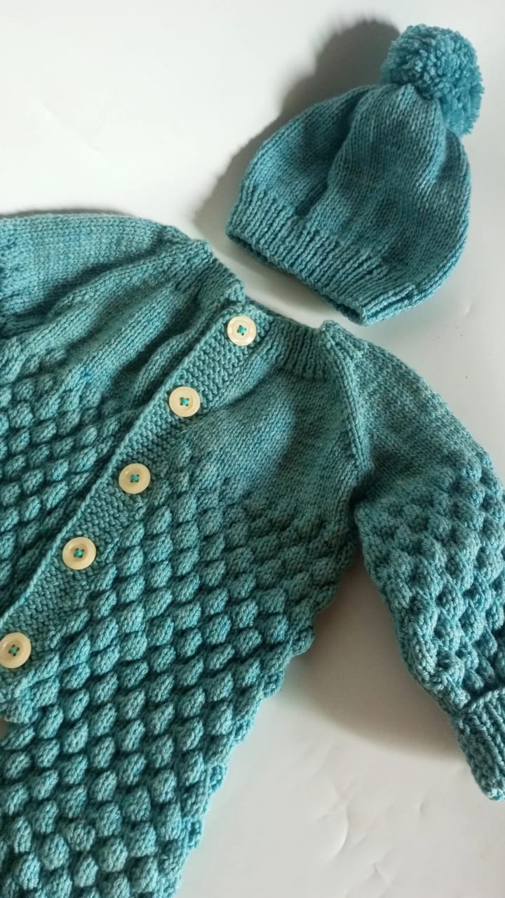 Bubble romper set in soft turquoise.